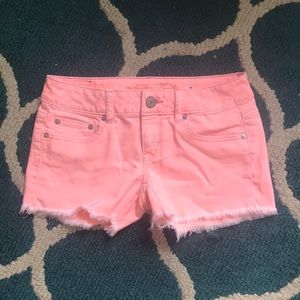 Pink distressed American Eagle jean shorts-size 4